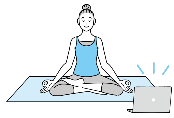 オンラインヨガで瞑想する女性